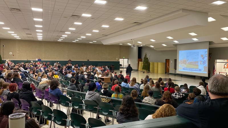 Taz Wallace talks to students at THS during mental health expo