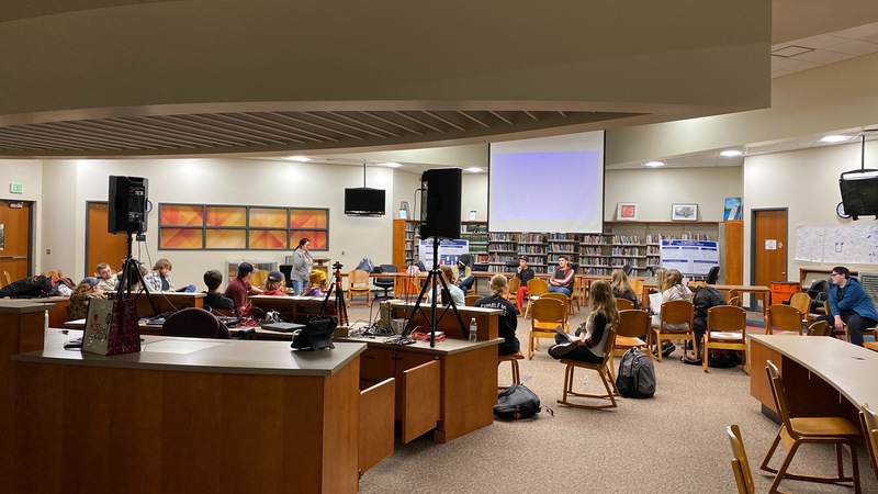 Students listen to a lecture during mental health expo